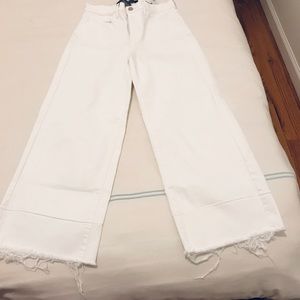 White Wide-leg Jeans with frayed bottoms